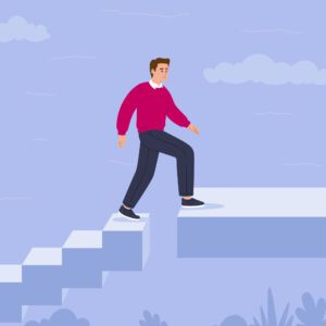 Hombre subiendo escaleras y salvando un escalón